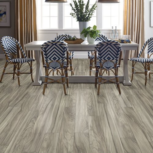Chairs around the table from Butler Floors in Austin